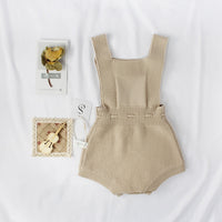 Knitted woolen jumpsuit for babies and toddlers