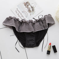 Low-rise ladies briefs with flashing ribbons