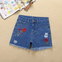 Rose white ripped jeans