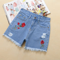 Rose white ripped jeans