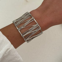 Bold Exaggerated C-shaped Alloy Bracelet With A Brushed Finish