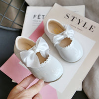 Children's candy colored leather shoes