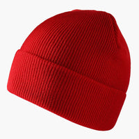 The new knitted woolen hat is thick and warm in solid color