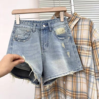 Plus-size High-waisted Ripped Denim Shorts For Women