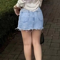 Ripped Denim Mini With Raw Hem Street-style Casual Denim Skirt Featuring Pockets