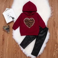 Two-piece hooded sweater and leather pants