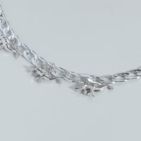 Dinosaur Pendant With A Silver Chain Simple And Versatile