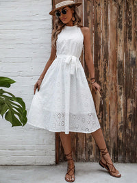 Elegant White Embroidered High-waisted Halter Dress With A Cinched Waist