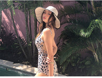Leopard-print cross-back swimsuit
