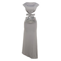 And Elegant Backless Top Paired With A Patchwork Maxi Skirt