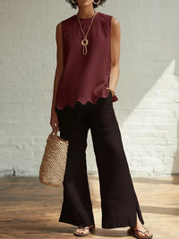 Crew-neck Sleeveless Shirt With A Wave Hem