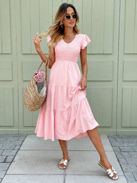 Pink Midi Dress With Ruffled Sleeves And A Tiered Hem
