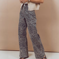 New High-waisted Slightly Flared Trousers With A Unique Print