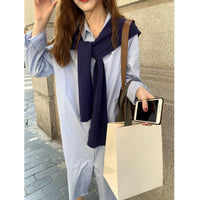 A Warm And Cozy Wool Shawl Or A Lightweight Cardigan That Can Be Layered