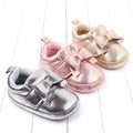 Shiny bow baby shoes