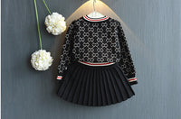 Two piece sweater and skirt suit