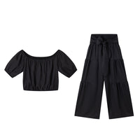 High-waisted Solid-color Flared Pants With Tie Detailing And A Flowing Drape