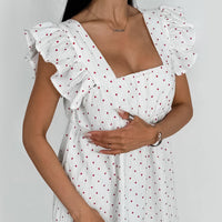 White Sleeveless Dress With Heart Print And Ruffle Trim