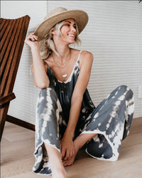Loose sling tapered printed jumpsuit
