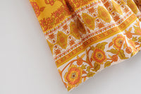 Holiday series orange flower sling jumpsuit