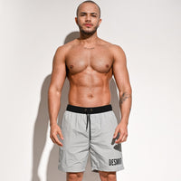 Men's Fashion Casual Solid Color Soakable Five-point Swimming Trunks