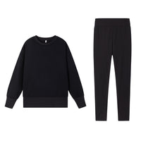 Casual Relaxed Fit Long Sleeve Crew Neck Top With Side Slits Paired With Matching Sweatpants