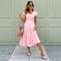 Pink Midi Dress With Ruffled Sleeves And A Tiered Hem