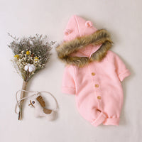 Knitted jumpsuit with fur collar