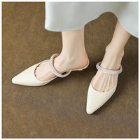 Stylish Stiletto Heels With Rhinestone Detailing And A Closed Toe