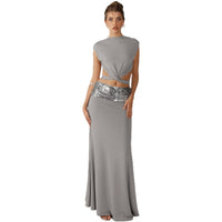 And Elegant Backless Top Paired With A Patchwork Maxi Skirt