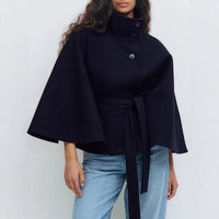 Trench Coat With A Stand-up Collar Buttons And A Belt