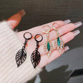 Chic Black Zircon Leaf Earrings With A Stylish Vibe