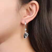Stylish Diamond-encrusted Butterfly Earrings With A Niche Designer-inspired Look