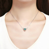 Elk inlaid heart-shaped blue zircon pendant