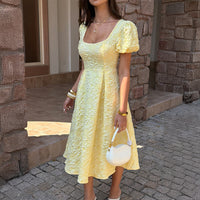 Elegant High-waisted A-line Dress With Puff Sleeves That Create A Slimming Elongating Look