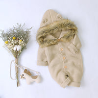 Knitted jumpsuit with fur collar