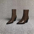 Short British Style Dr Martens Boots With A Chunky Heel And A Pointed Toe