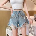 Fashion Heavy Industry Diamond Fringed Suede Ground Hole High Waist Micro Rattan Shorts