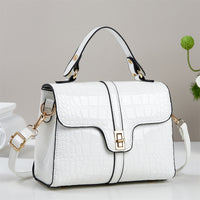 Sleek Stone-patterned Patent Leather Crossbody Bag That Pairs Effortlessly With Any Outfit