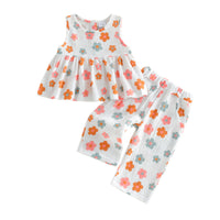 Flowy Sleeveless Top With A Full Floral Print Paired With Pocketed Pants