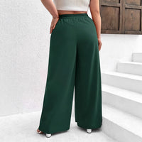 Green Draping Design Featuring Button Details And Pockets
