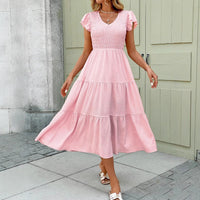 Pink Midi Dress With Ruffled Sleeves And A Tiered Hem