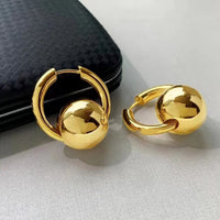 Sleek Round Ball Ear Clips In A Cool Western-style Design
