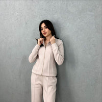 Solid Color Skin Friendly Womens Outerwear Set Featuring A Stand Up Collar And Zipper