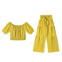 High-waisted Solid-color Flared Pants With Tie Detailing And A Flowing Drape