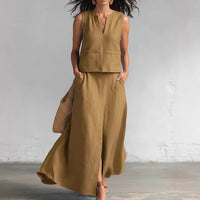 A Simple And Elegant Two-piece Set Featuring A V-neck Top And A Skirt