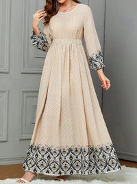 Ethnic-style Printed Wrap Dress Featuring A Cinched Waist Belt And A Flared, Long Skirt