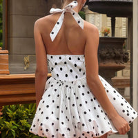 Figure-flattering Short Skirt That Cinches At The Waist To Create A Slimming Look