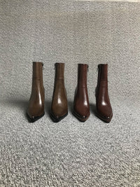 Short British Style Dr Martens Boots With A Chunky Heel And A Pointed Toe