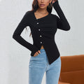 Irregularly Arranged Buttons Create A Sophisticated Top